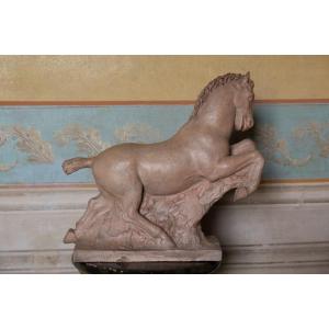 Scultura in terracotta:  Cavallo a galoppo in terracotta. Firmato Giorgio Rossi.