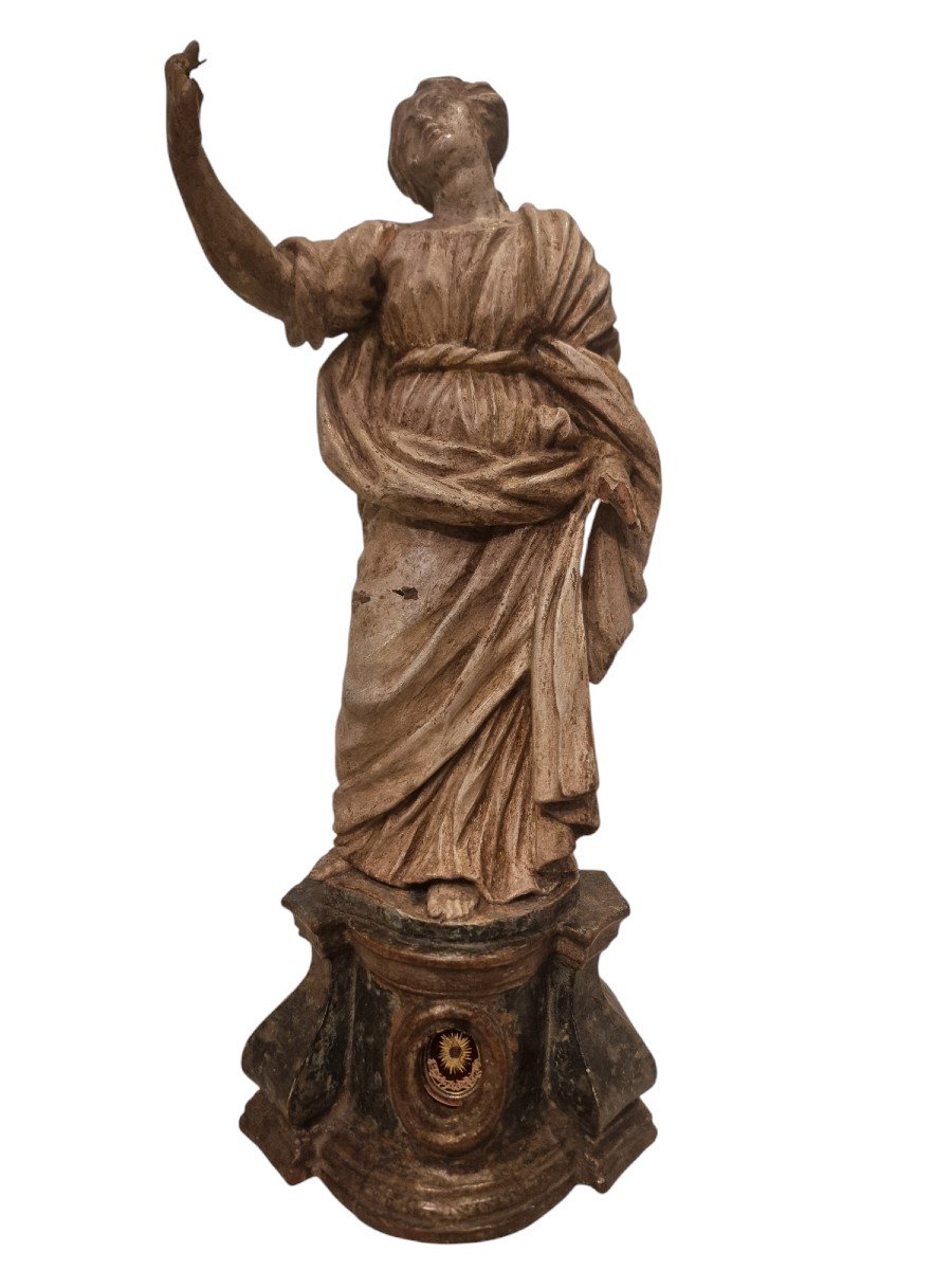 Scultura in legno intagliato e policromo, con reliquia