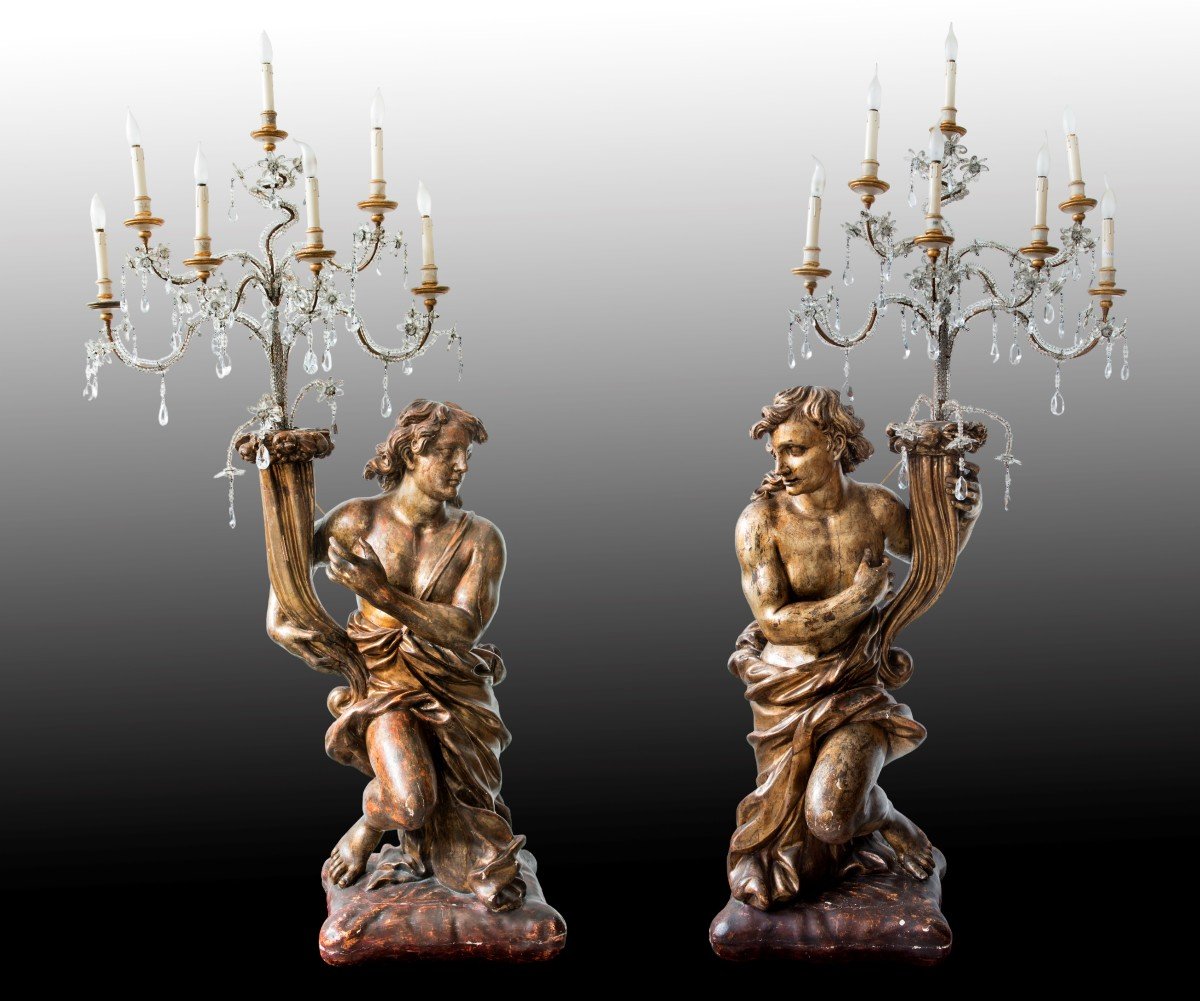 Coppia di candelieri legno scolpito e dorato realizzate da uno scultore del XVII secolo