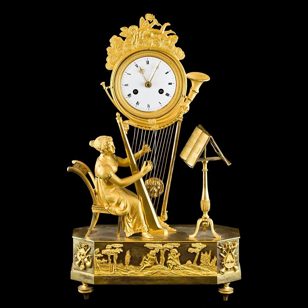 Orologio da tavolo Impero in bronzo dorato a mercurio