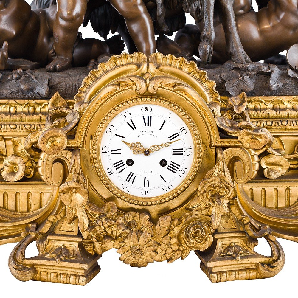 Orologio francese raffigurante putti che giocano con una capra-photo-2