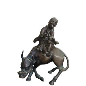 Scultura bronzo raffigurante saggio su bufalo. Cina,fine XIX secolo.