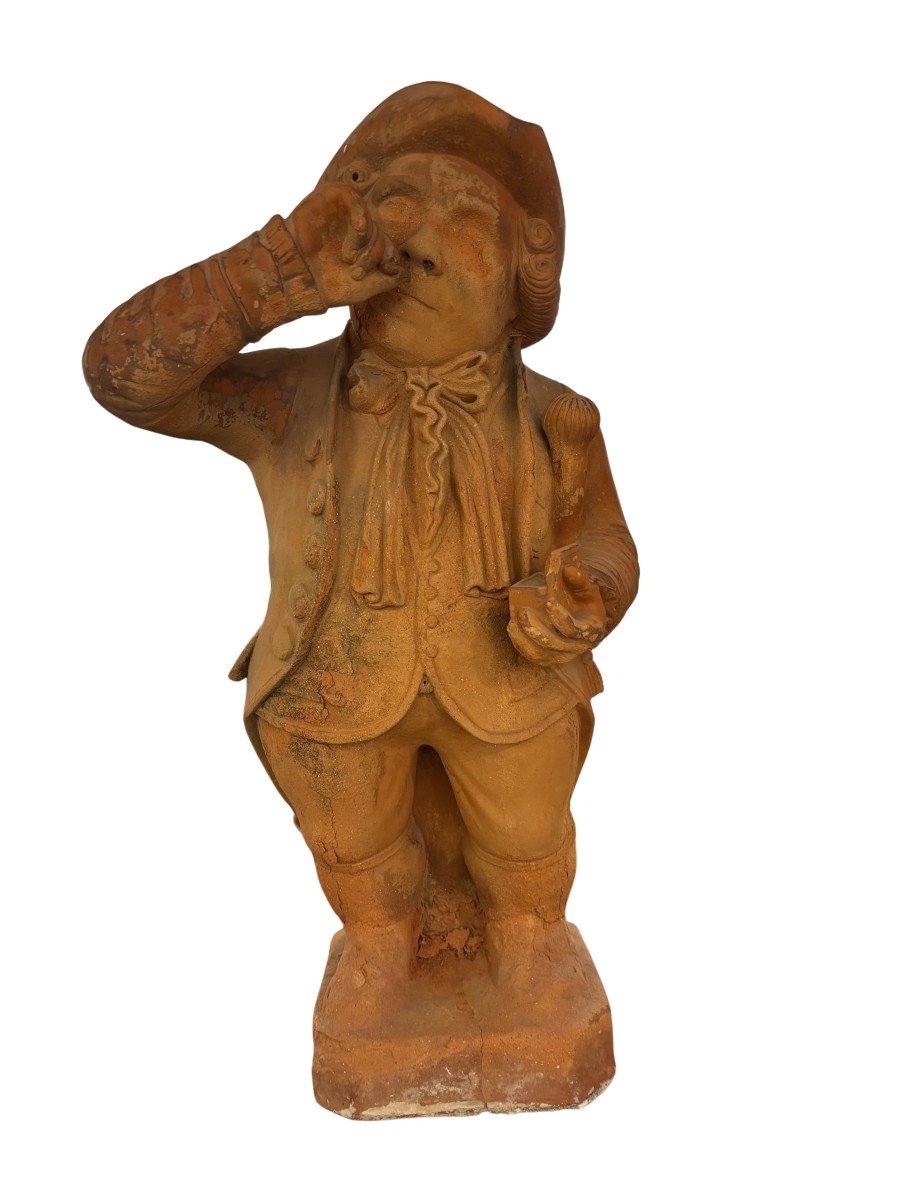 scultura in terracotta raffigurante uno sniffatore di tabacco