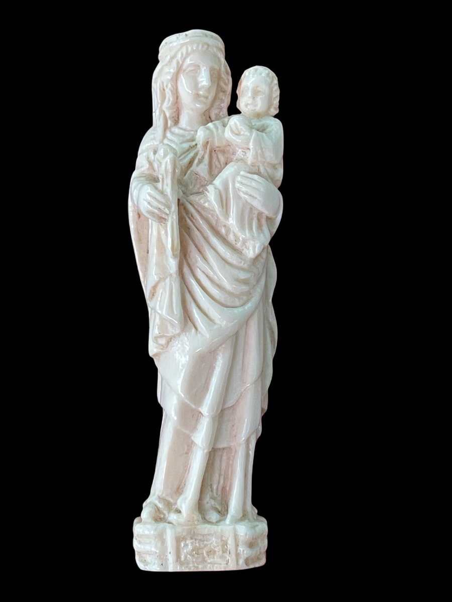 Scultura a bassorilievo in avorio raffigurante Madonna con Bambino.-photo-2