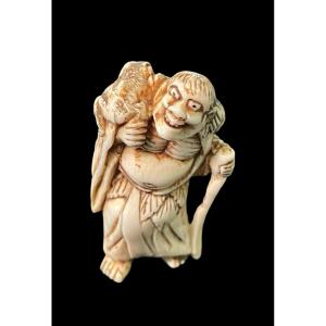 Netsuke in avorio raffigurante personaggio maschile 