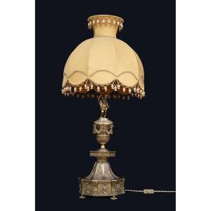 Lampada antica in ottone stile Napoleone III Francese appartenente agli inizi del XX secolo.