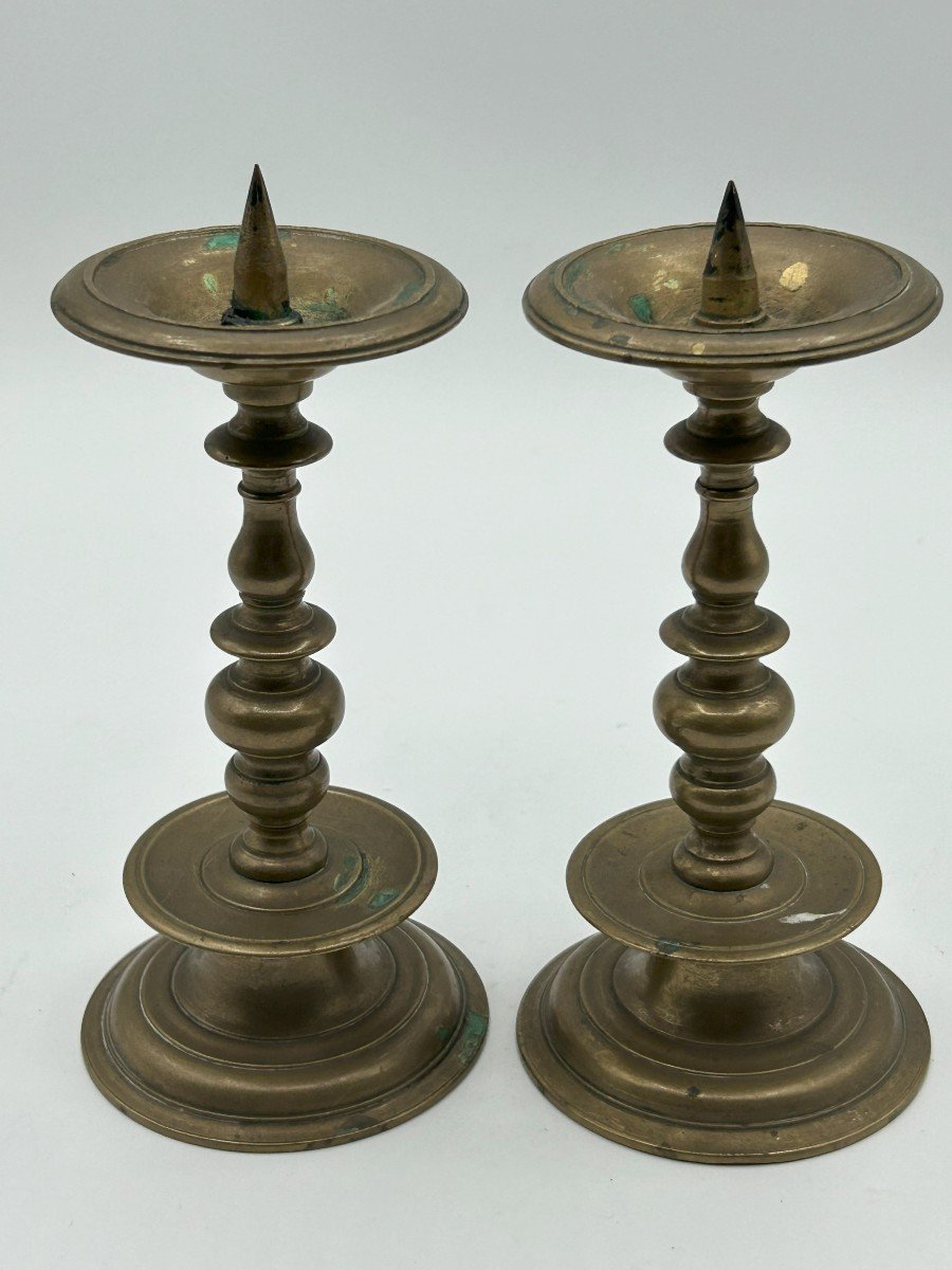 Candelabro a rocchetto in bronzo