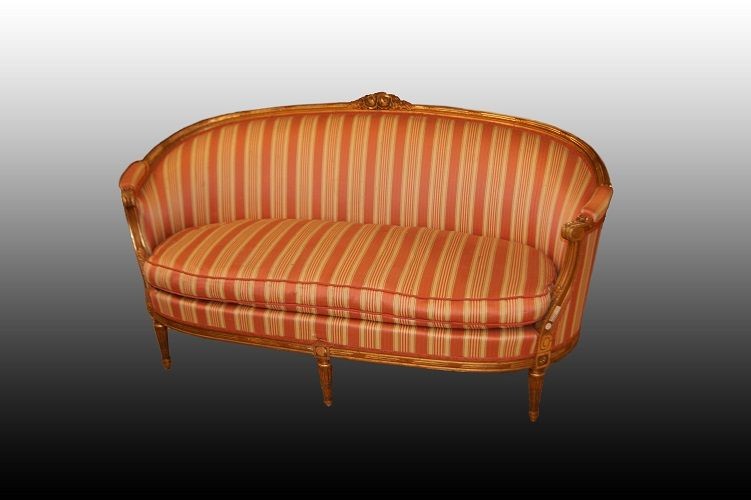 Antique large French gilt Louis XVI style sofa from 1800