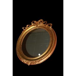 Specchiera ovale Francese in legno dorato foglia oro del 1800