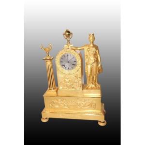 Orologio da tavolo francese della prima metà del 1800, stile Impero, in bronzo dorato