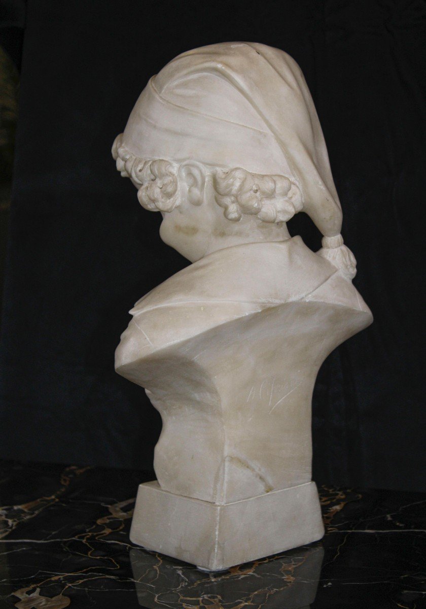 Busto raffigurante un fanciullo che sorride Marmo-photo-1