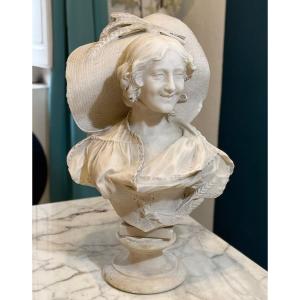 Busto raffigurante giovane donna sorridente Marmo