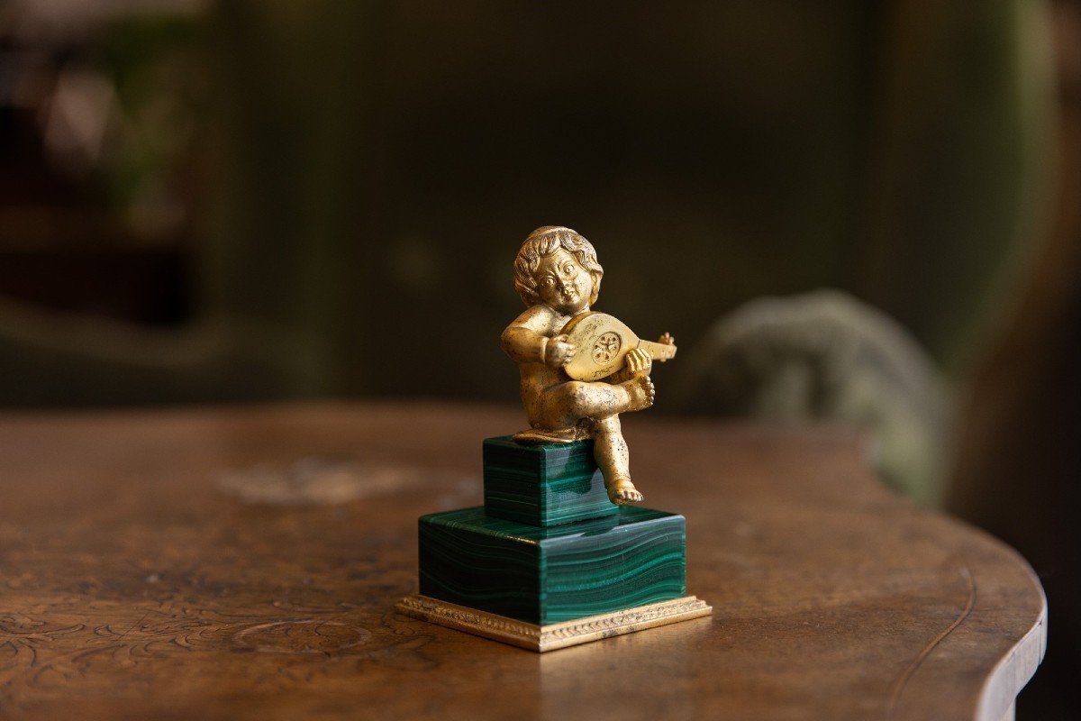 Putto in malachite e bronzo dorato