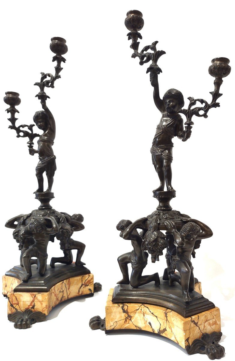 Coppia di candelabri in bronzo