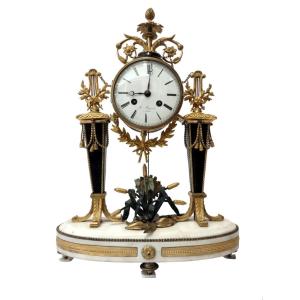 Orologio Luigi XVI in marmo e bronzo dorato