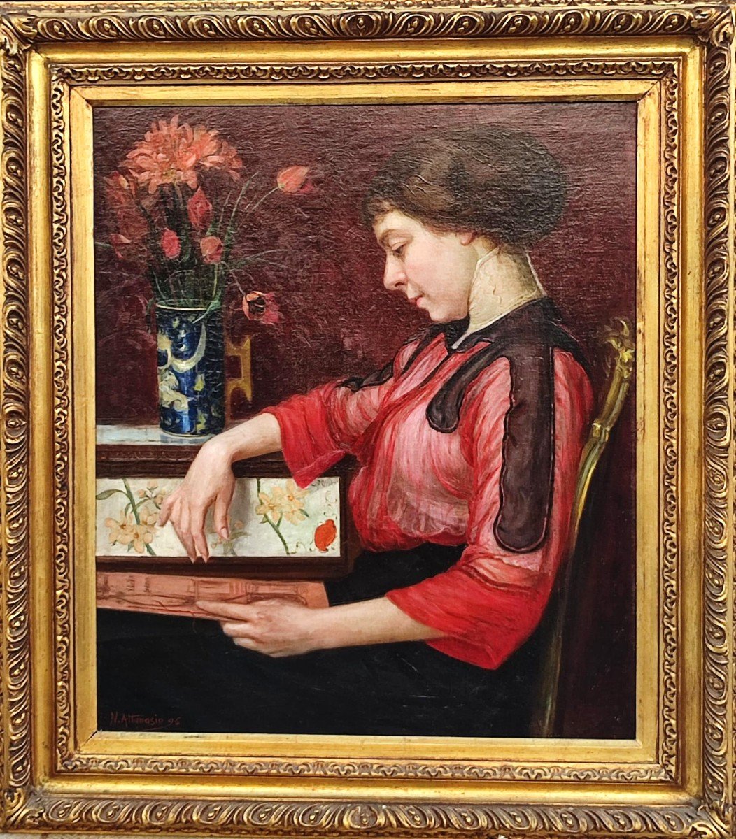 'Natale Attanasio 1896-  'La Ragazza con l'album''  Olio su tela entro cornice originale.