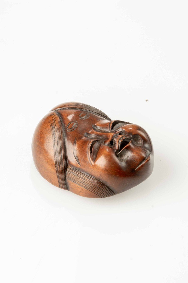 Netsuke in legno di bosso raffigurante Okame-photo-4