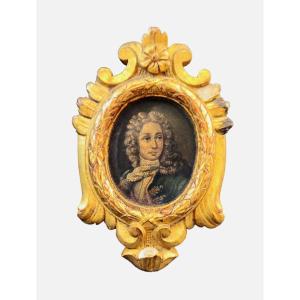Antico ritratto di nobile con cornice in legno dorato