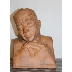 BUSTO DI UN UOMO ASIATICO IN TERRACOTTA, GASTON HAUCHECORNE (1880-1945).