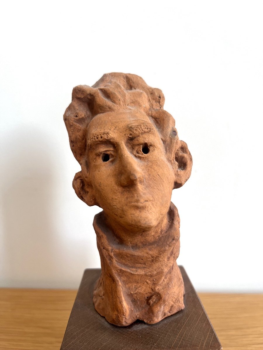 Figura maschile in terra cotta