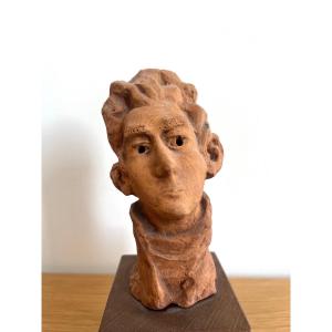 Figura maschile in terra cotta