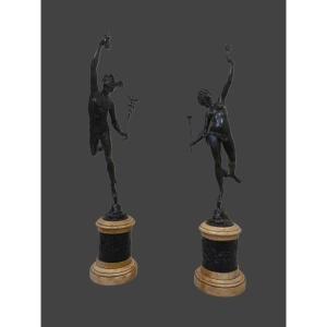 COPPIA DI SCULTURE IN BRONZO PATINATO  