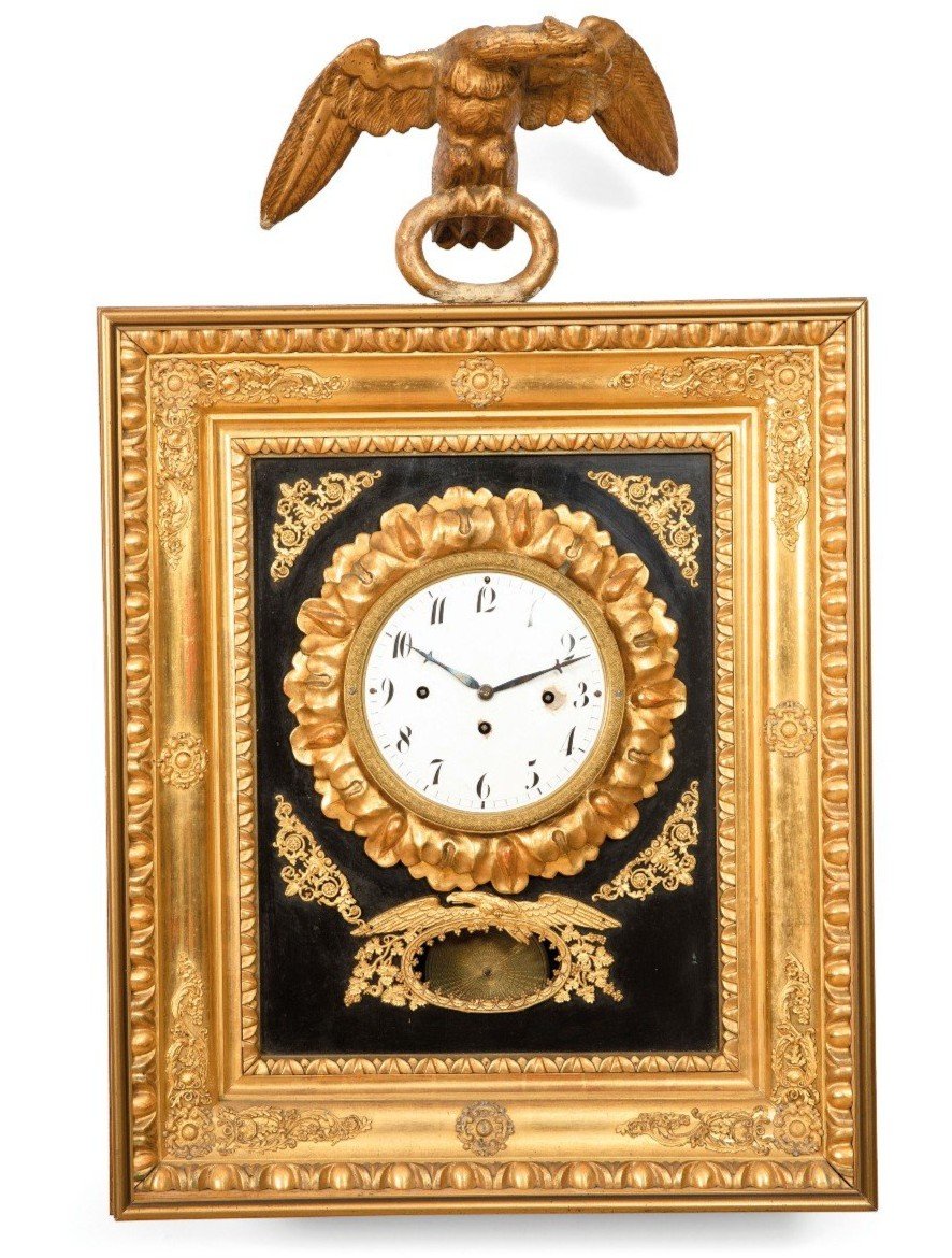 antico orologio Impero in legno dorato a zecchino