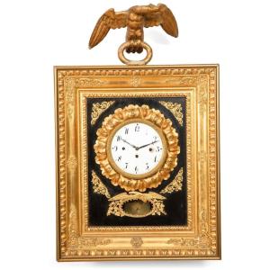 antico orologio Impero in legno dorato a zecchino