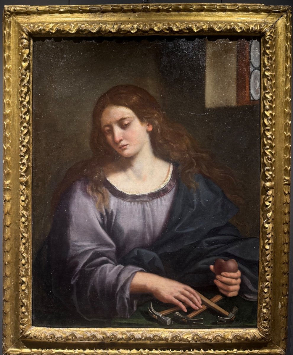 Maria Maddalena con il sacro cuore di gesu contempla gli strumenti della passione