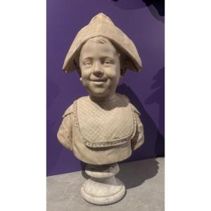 busto di bambino con cappello