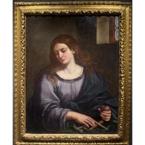 Maria Maddalena con il sacro cuore di gesu contempla gli strumenti della passione