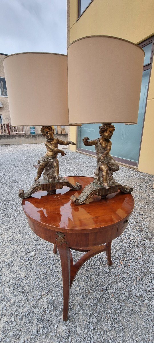 Coppia di putti (maschio/femmina) portalampade