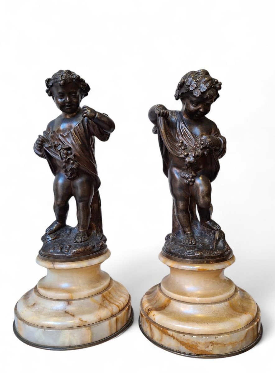 Coppia di putti in bronzo cesellato