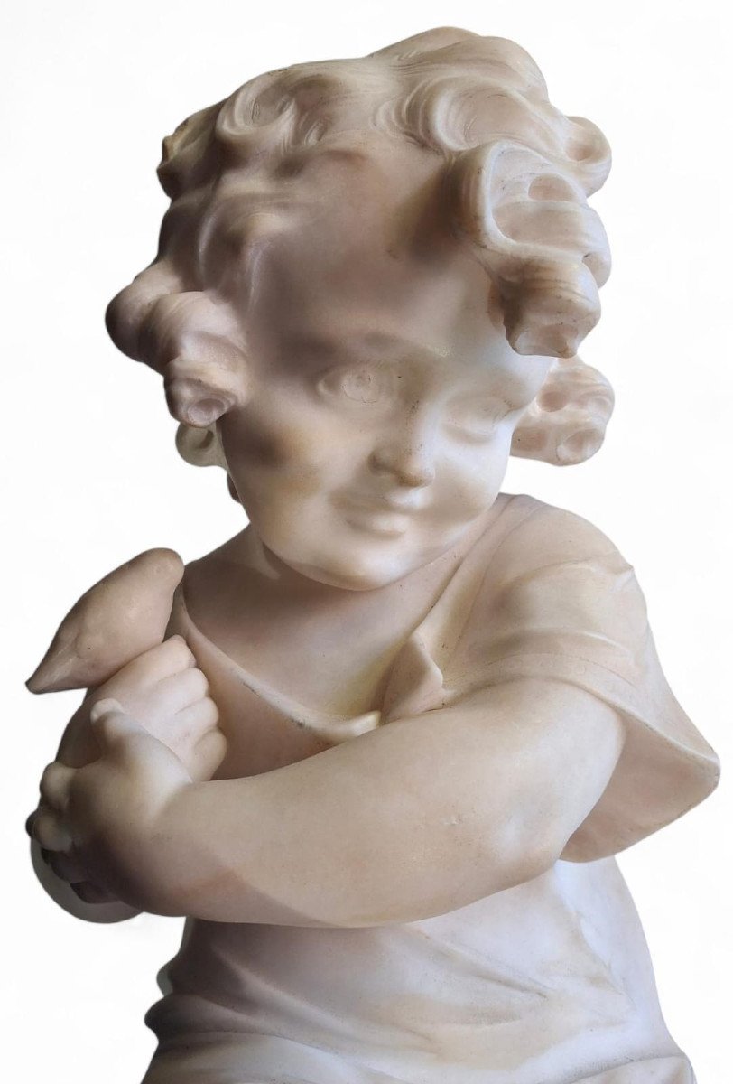 Scultura raffiurante Bambina con uccellino-photo-2