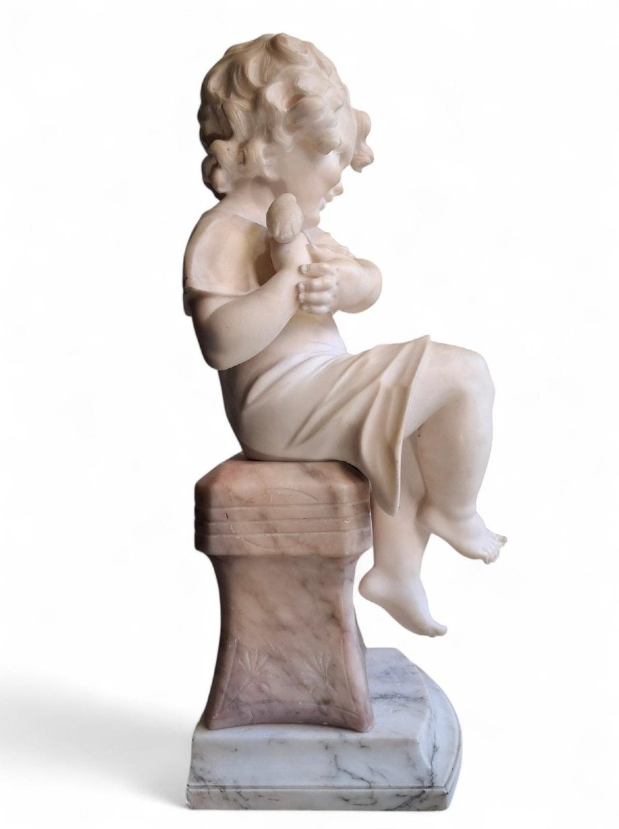 Scultura raffiurante Bambina con uccellino-photo-3