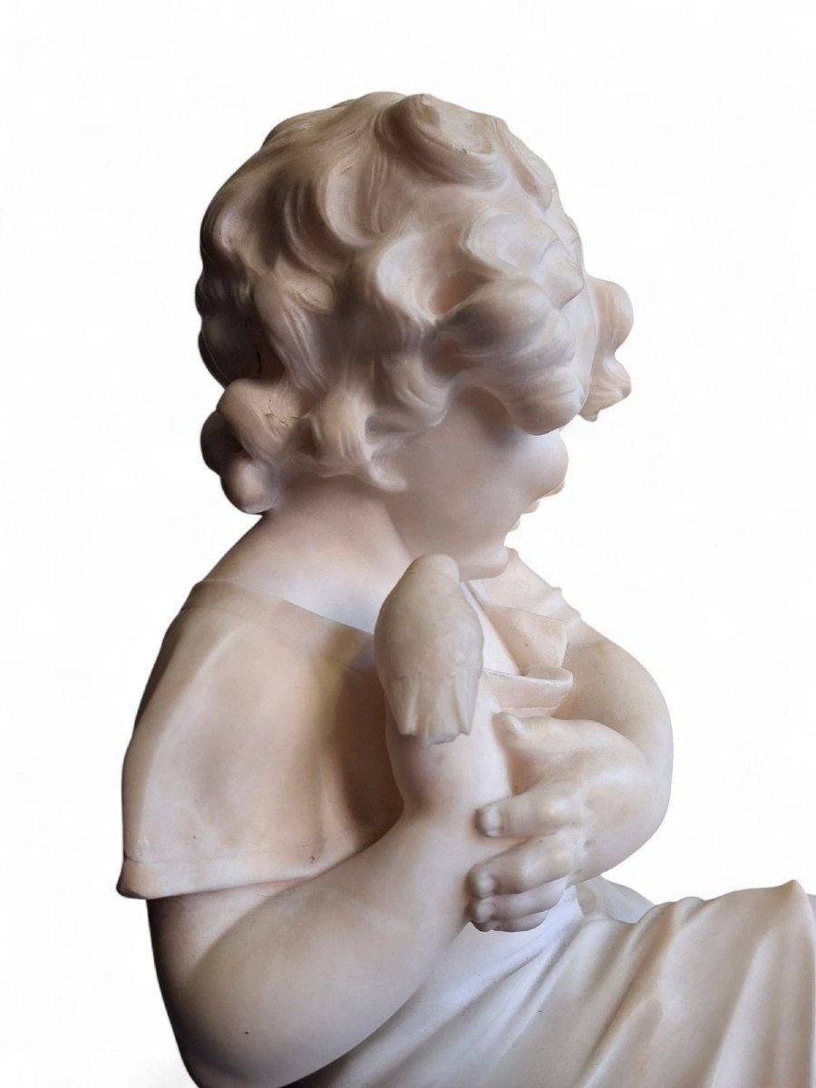 Scultura raffiurante Bambina con uccellino-photo-4