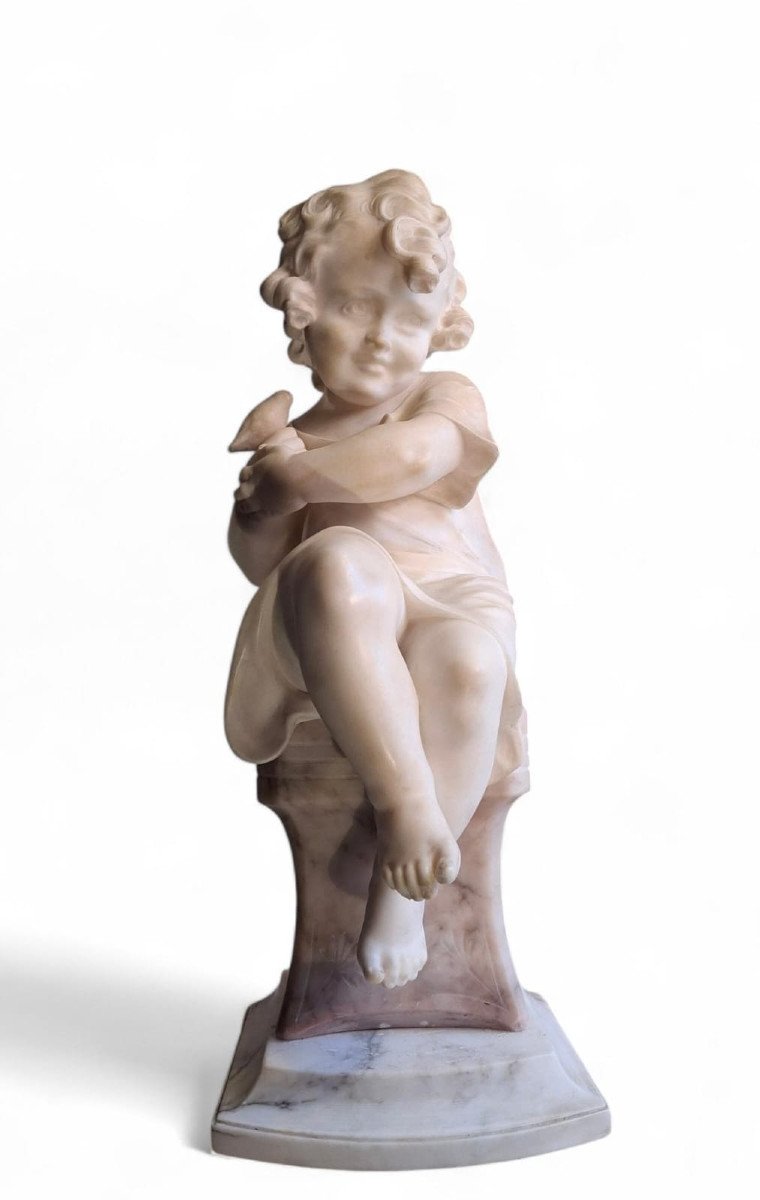 Scultura raffiurante Bambina con uccellino