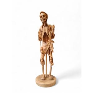 Memento Mori, scultura raffigurante uno scheletro incappucciato