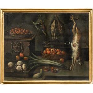 Maestro italiano (inizi XVII sec.) - Natura morta con frutta, verdura e cacciagione.